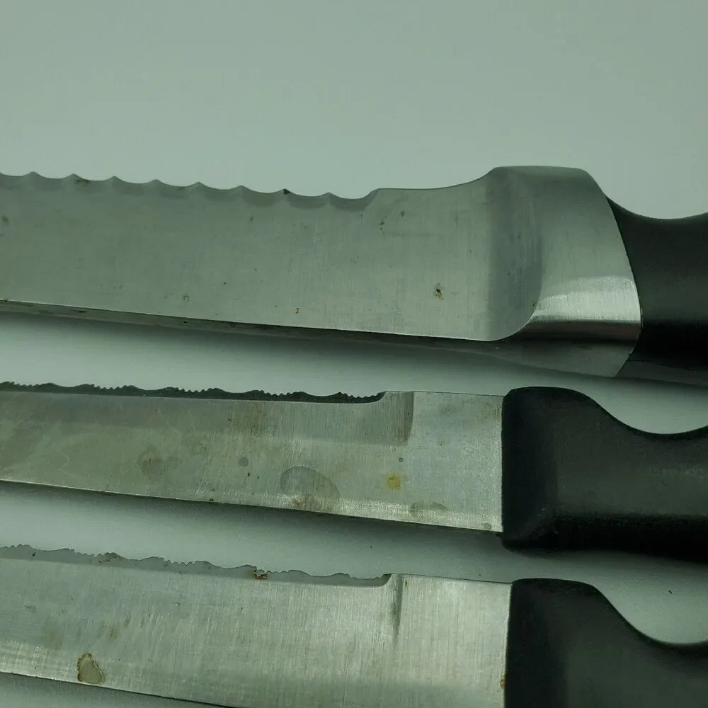 Set of 5 Copco Chefs Knives Bread, Steak x2, Utility x2 READ. Small Rust Spots